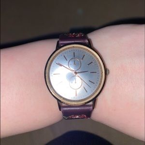 cute watch maroon with embroidered flowers on both sides (worn once)